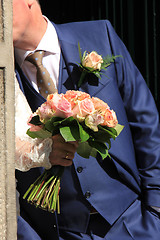Image showing Bride holding her bouquet