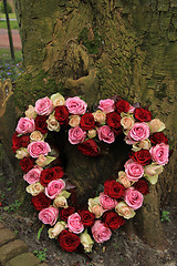 Image showing Heart shaped sympathy flowers