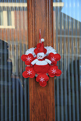 Image showing Christmas decoration on front door
