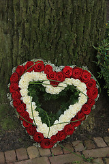 Image showing Heart shaped sympathy flowers