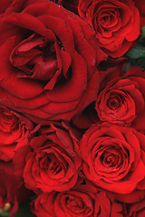 Image showing Red roses in a bridal bouquet