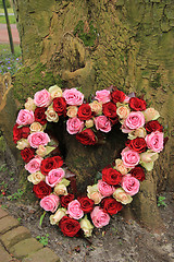 Image showing Heart shaped sympathy flowers