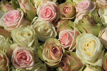 Image showing White and Pink roses in wedding arrangement