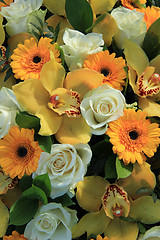 Image showing Cymbidium orchids, Gerberas and roses