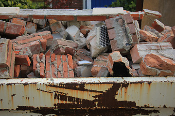 Image showing Bricks in a dumpster