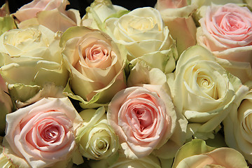 Image showing White and Pink roses in wedding arrangement