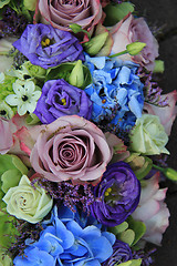 Image showing Blue and purple bridal bouquet