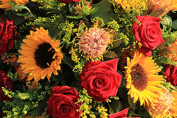 Image showing Sunflowers and roses