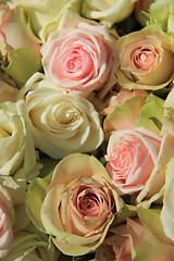 Image showing White and Pink roses in wedding arrangement