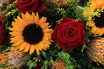 Image showing Sunflowers and roses