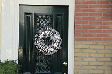 Image showing Merry Christmas decoration on front door