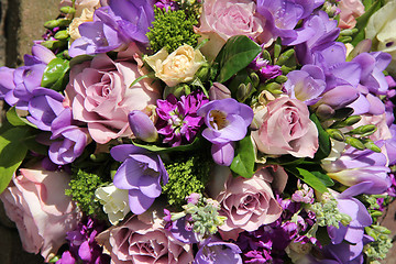 Image showing Bridal bouquet in various shades of purple