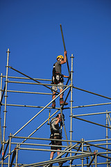 Image showing Construction worker on scaffolding
