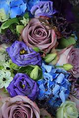Image showing Blue and purple bridal bouquet
