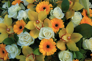 Image showing Cymbidium orchids, Gerberas and roses