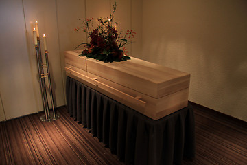 Image showing Wooden casket in funeral home