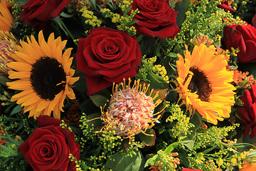 Image showing Sunflowers and roses