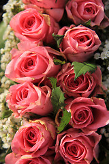 Image showing Pink roses and baby breath bouquet