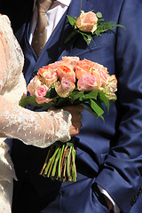 Image showing Bride holding her bouquet