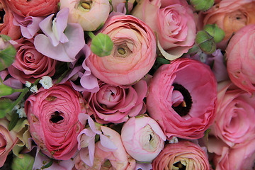 Image showing Pink roses and ranunculus bridal bouquet