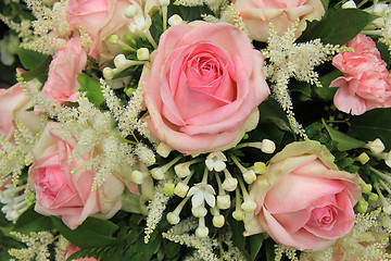 Image showing Pink roses and stephanotis in bridal bouquet