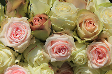 Image showing White and Pink roses in wedding arrangement