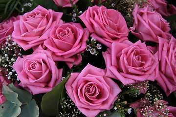 Image showing Big pink roses in a bridal bouquet