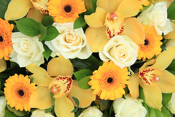 Image showing Cymbidium orchids, Gerberas and roses