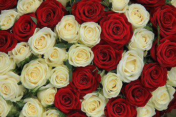 Image showing Red and white roses in a wedding arrangement