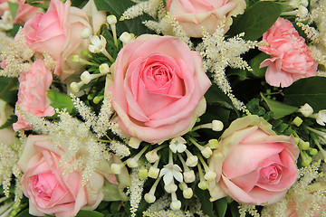 Image showing Pink roses and stephanotis in bridal bouquet