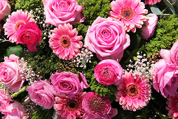 Image showing Ranunculus, roses and gerberas in a wedding arrangement