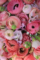 Image showing Pink roses and ranunculus bridal bouquet