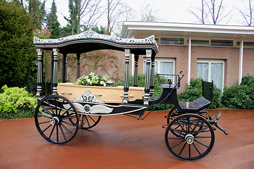 Image showing Classic funeral carriage with coffin