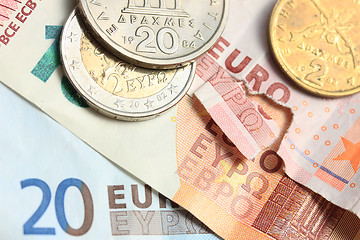 Image showing Greek coins on euro notes