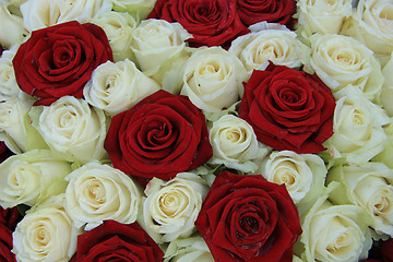 Image showing Red and white roses in a wedding arrangement