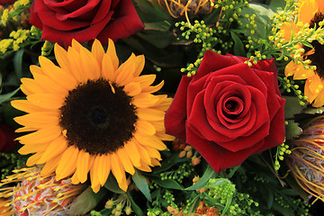 Image showing Sunflowers and roses
