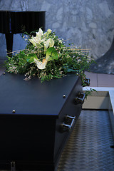 Image showing Coffin with funeral flowers