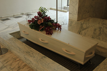 Image showing Coffin with funeral flowers