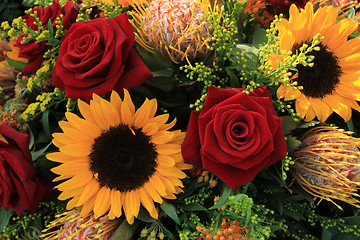 Image showing Sunflowers and roses