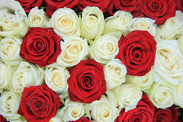 Image showing Red and white roses in a wedding arrangement