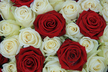 Image showing Red and white roses in a wedding arrangement