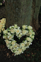 Image showing Heart shaped sympathy flowers