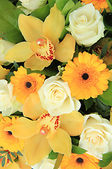 Image showing Cymbidium orchids, Gerberas and roses