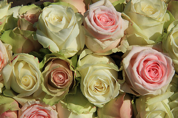 Image showing White and Pink roses in wedding arrangement