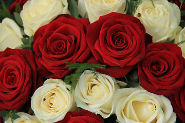 Image showing Red and white roses in a wedding arrangement