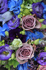 Image showing Blue and purple bridal bouquet