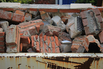 Image showing Bricks in a dumpster