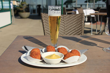 Image showing Beer and snacks