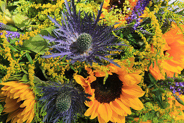 Image showing Blue and yellow Sunflower arrangement, Wedding decorations