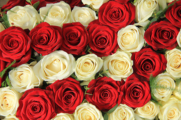 Image showing Red and white roses in a wedding arrangement